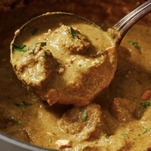 Lamb Madras Combo Served with complimentary long grain Basmati Rice separately, Butter Naan & Soft Drink